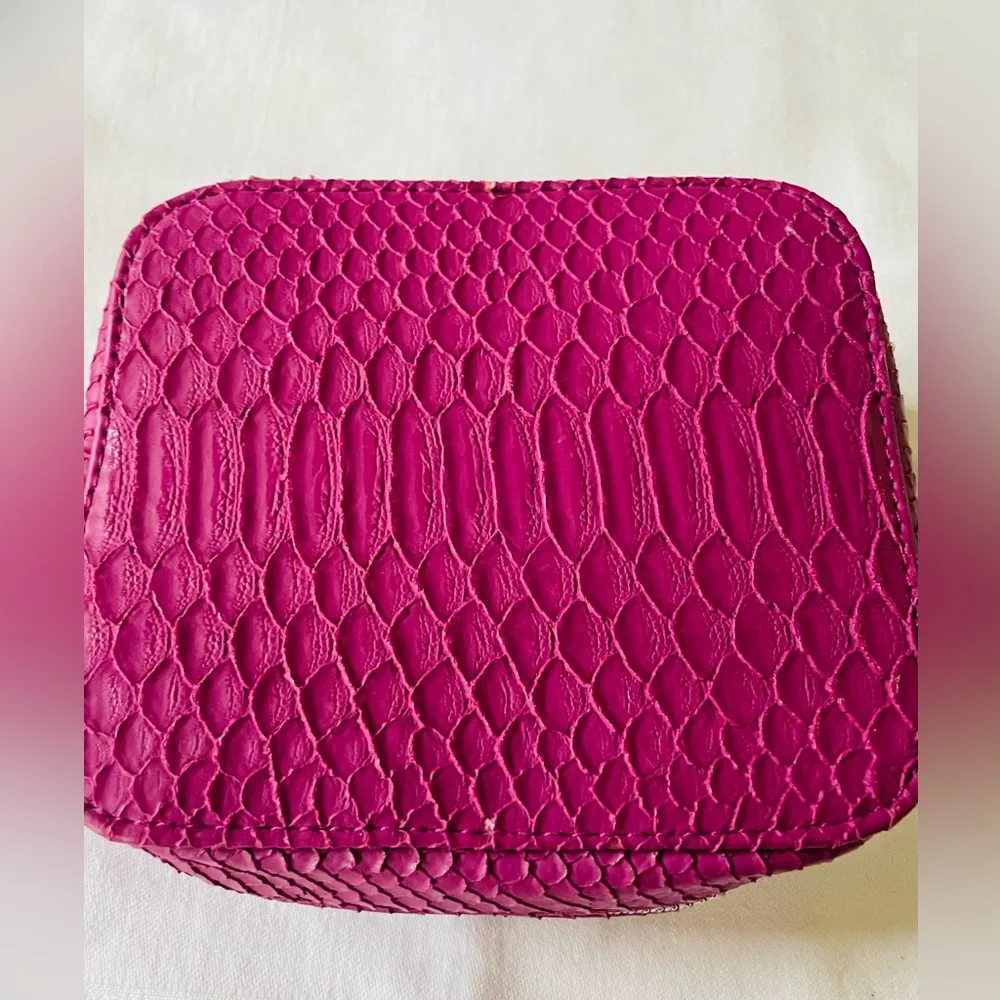 TRISH McEvoy embossed pink makeup planner